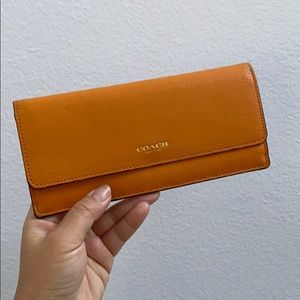 COACH WALLET IN LIGHT ORANGE